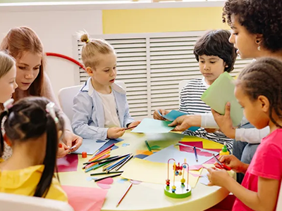 Children participating in art and craft activities at a community center.